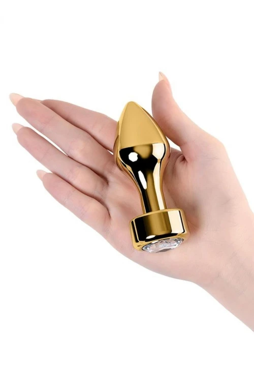 Gold anal plug TOYFA Metal with white round-shaped gem , length 7 cm, diameter 2-3,5 cm, weight 140 gr