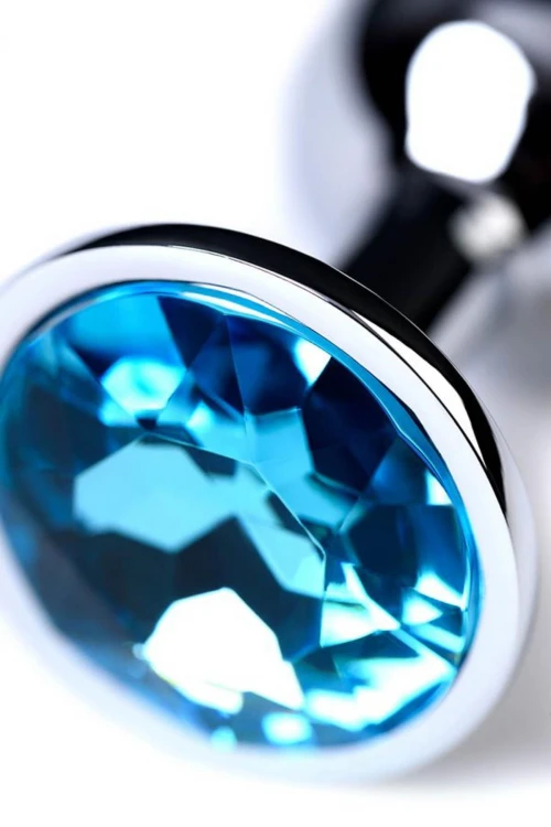 Silver anal plug TOYFA Metal,with a Topaz color gem