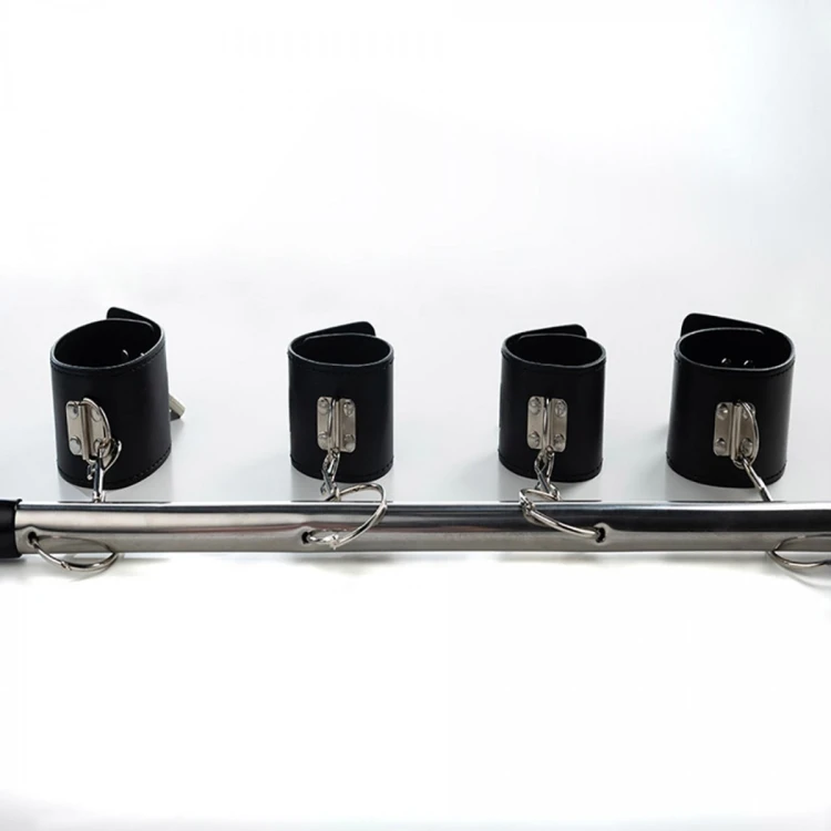 Spreader bar with wrist and ankle cuffs